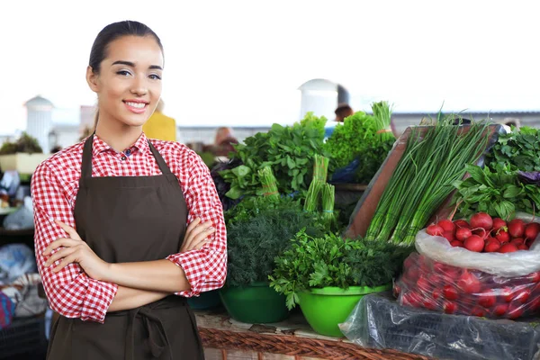 Young seller at market — Stock Photo, Image