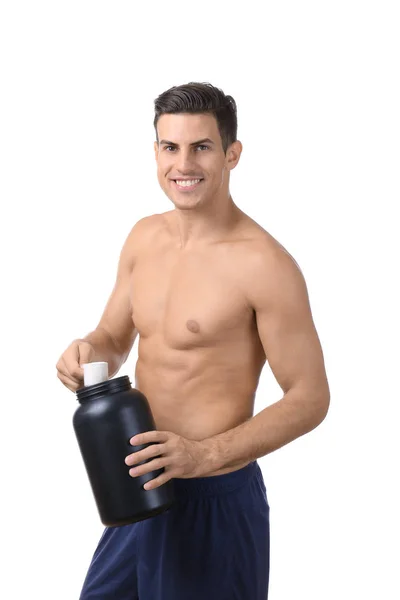 Hemdloser junger Mann hält schwarzes Glas mit Proteinpulver in der Hand — Stockfoto