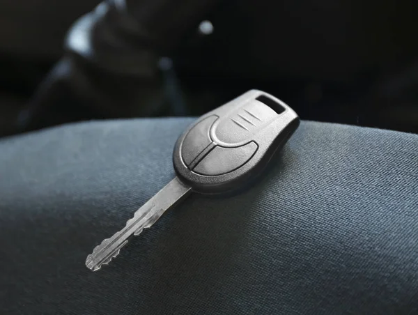 Car key on seat — Stock Photo, Image