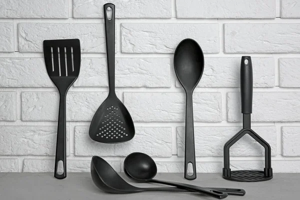 Kitchen utensils on table — Stock Photo, Image
