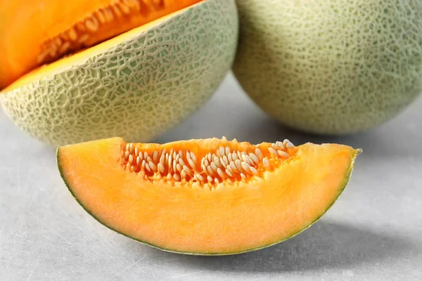 Fresh ripe melons on table — Stock Photo, Image