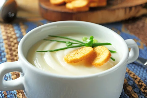 Ceramic bowl with potato cream soup — Stock Photo, Image