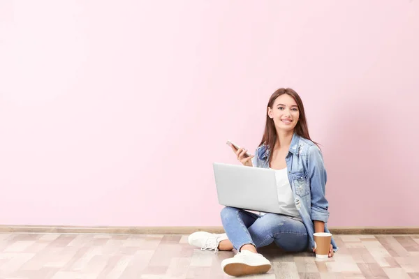 Young lady with modern laptop