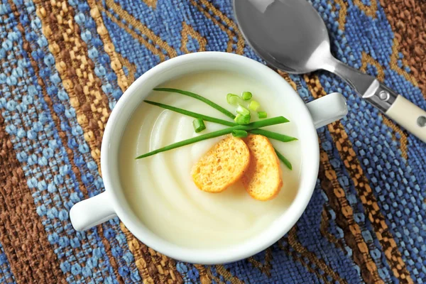 Ceramic bowl with potato cream soup — Stock Photo, Image