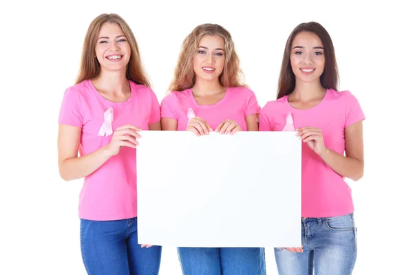 Mooie vrouwen houden poster op witte achtergrond — Stockfoto