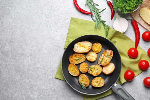 Composition with delicious rosemary potatoes — Stock Photo, Image