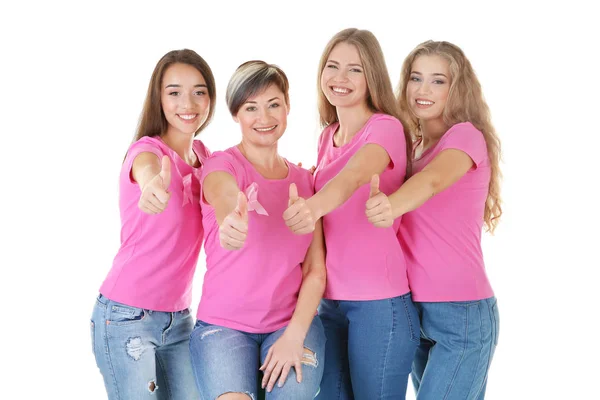 Beautiful women wearing t-shirts with pink ribbons on white background — Stock Photo, Image