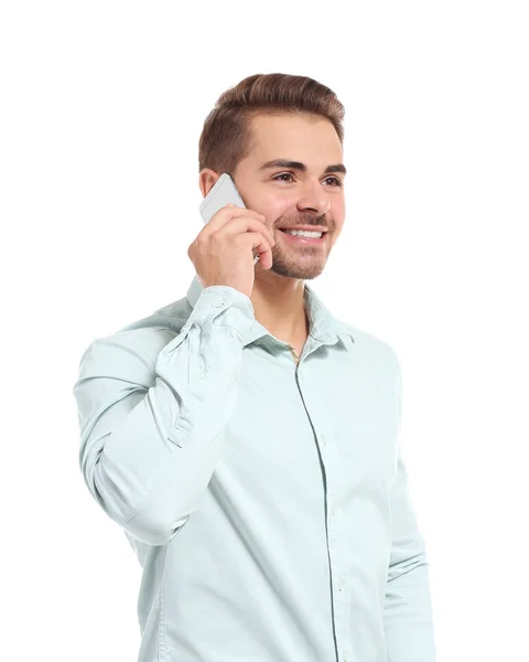 Jovem homem bonito falando em seu telefone celular — Fotografia de Stock