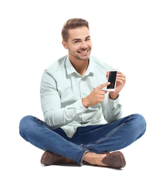 Молодой красивый мужчина с мобильным телефоном — стоковое фото