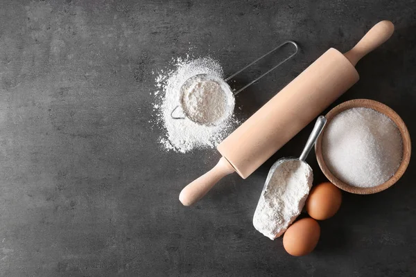 Composition with flour on gray table — Stock Photo, Image