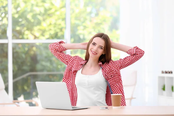 Young lady with modern laptop — Stock Photo, Image
