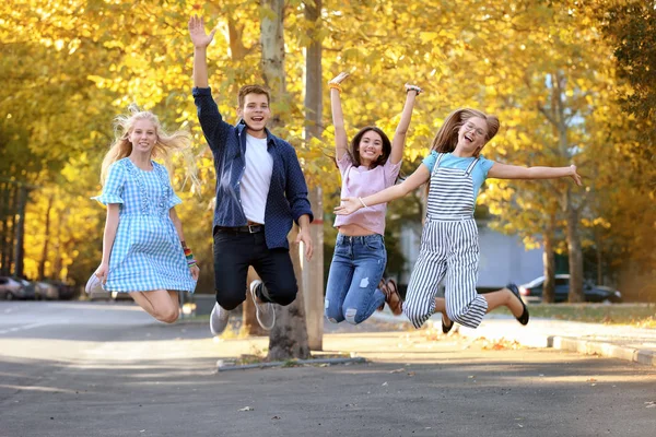 Happy teenagers on city street — Stock Photo, Image