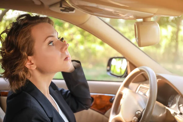 Young businesswoman in car — Stock Photo, Image
