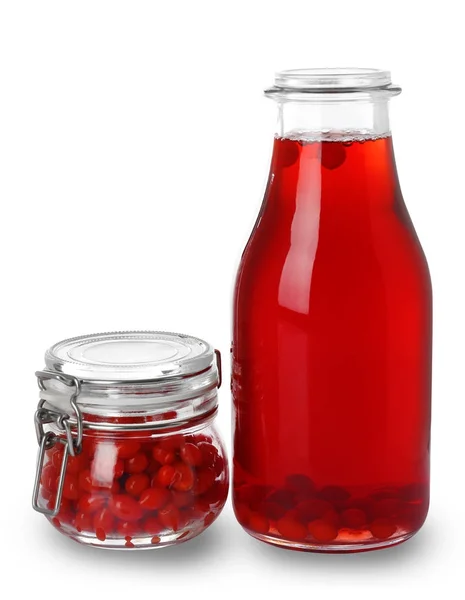 Bottle of goji juice and jar with berries — Stock Photo, Image