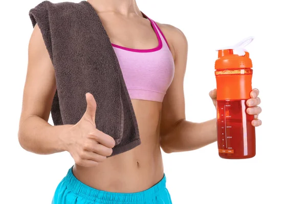 Young woman holding bottle with protein shake — Stock Photo, Image