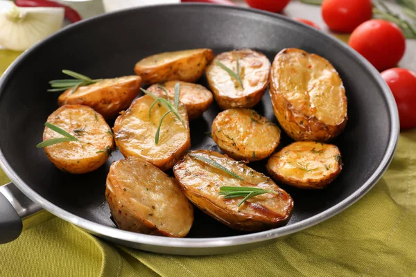 Delicious baked potatoes with rosemary — Stock Photo, Image