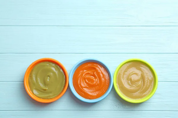 Bowls with baby food — Stock Photo, Image