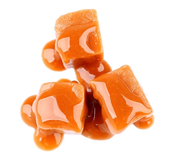 Sweet caramel candies with topping — Stock Photo, Image