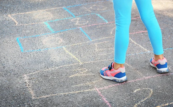 Child playing hopscotch — Stock Photo, Image