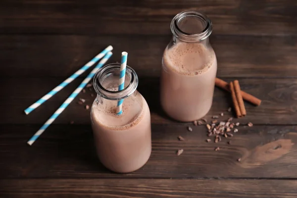 Bottles with yummy cocoa — Stock Photo, Image
