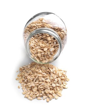 Çiğ yulaf ezmesi ile devrilmiş Cam Kavanoz