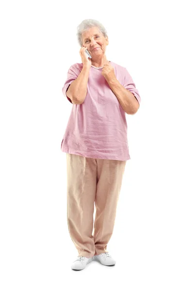 Elderly woman speaking on phone — Stock Photo, Image