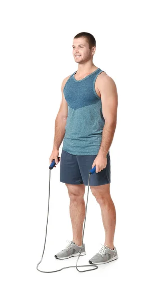 Young man with jumping rope on white background — Stock Photo, Image