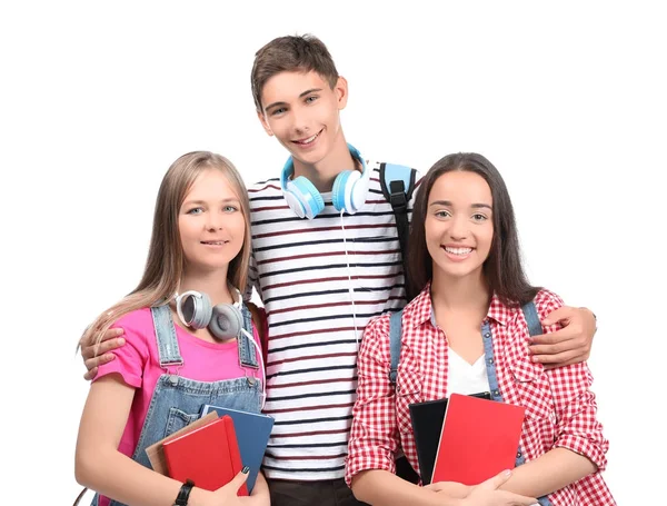 Unga studenter på vit bakgrund — Stockfoto