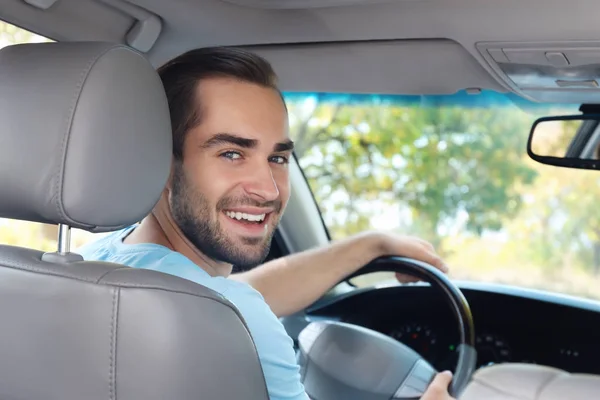 Man on driver seat of car — Stock Photo, Image