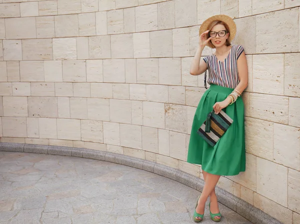 Young woman in green skirt — Stock Photo, Image