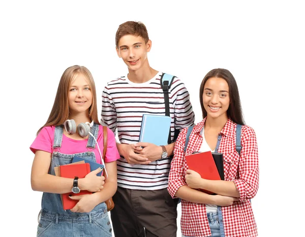 Junge Studenten auf weißem Hintergrund — Stockfoto