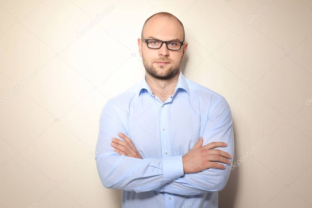 Young man on light background