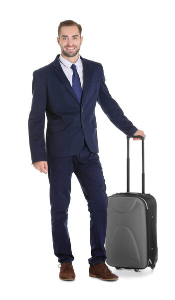 Attractive male tourist in formal suit on white background