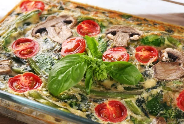 Spinach frittata in baking dish — Stock Photo, Image
