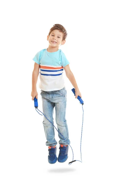 Cute boy skipping rope on white background — Stock Photo, Image