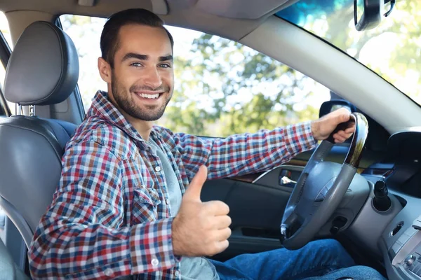 Man on driver seat of car — Stock Photo, Image