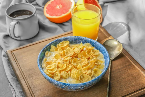 Dish with cornflakes and milk — Stock Photo, Image