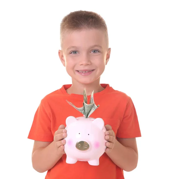 Kleiner Junge mit Sparschwein — Stockfoto