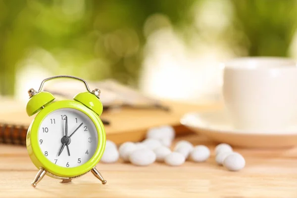 Alarm clock on table — Stock Photo, Image