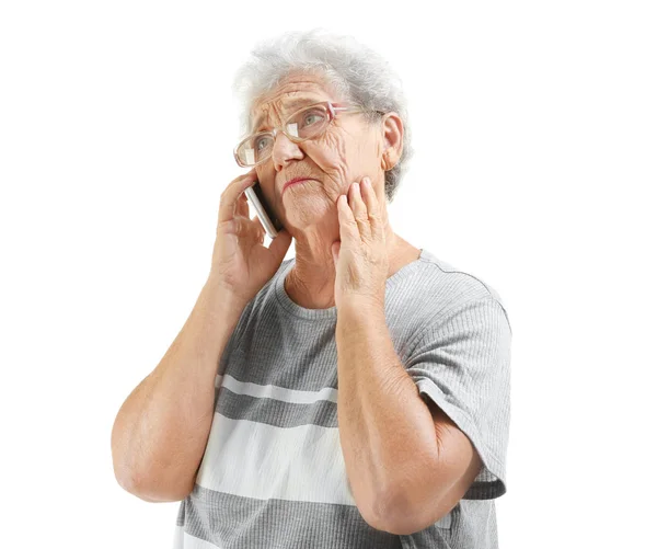 Elderly woman speaking on phone — Stock Photo, Image