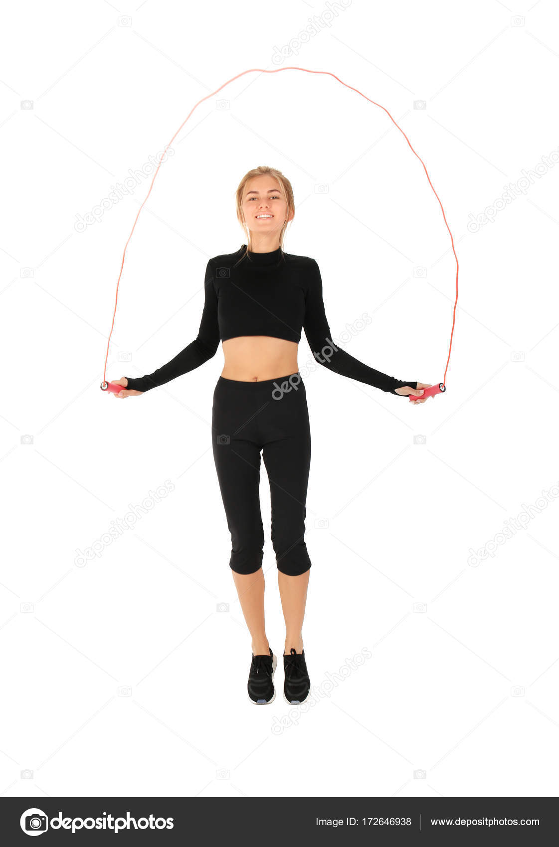 Woman jumping rope Stock Photo by ©belchonock 172646938