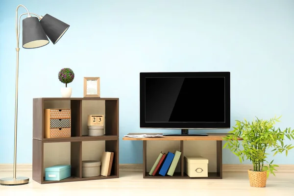 Modern TV set on in living room — Stock Photo, Image