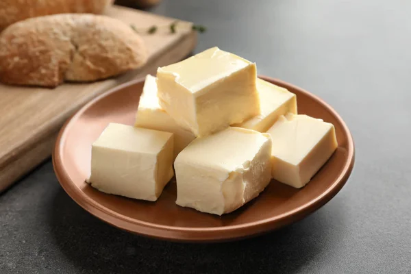 Plate with cubes of butter — Stock Photo, Image