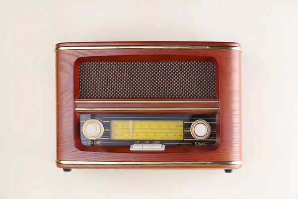 Retro radio on light background