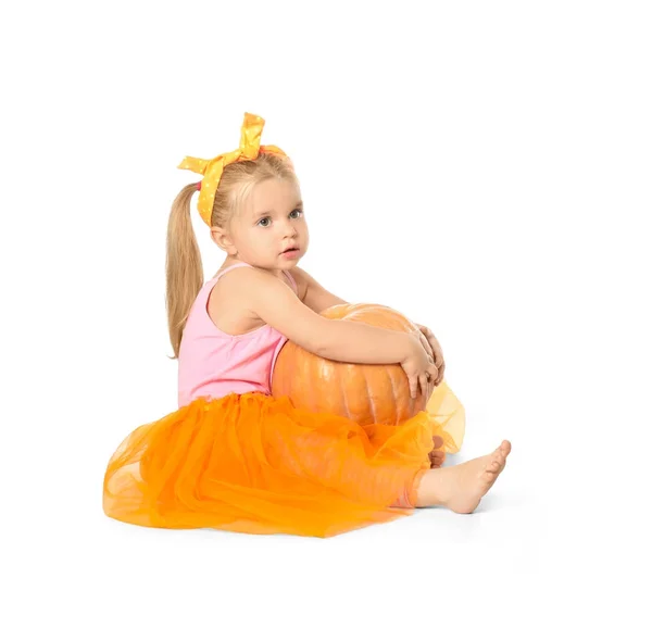 Adorable niña con calabaza — Foto de Stock