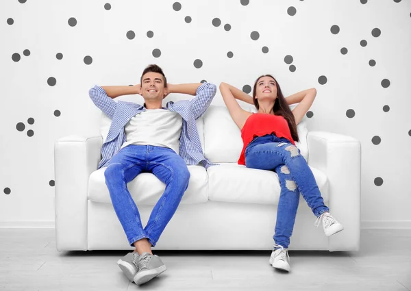 Young couple on sofa