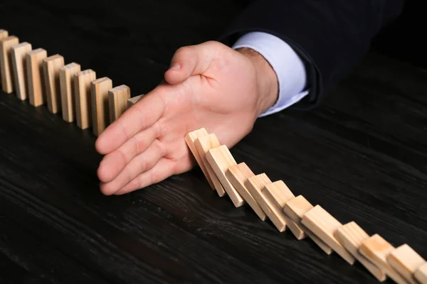 Young man with dominoes — Stock Photo, Image