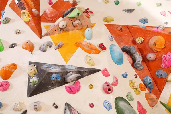 Climbing wall with artificial boulders — Stock Photo, Image