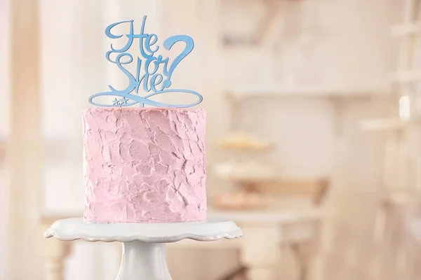 Stand with delicious cake for baby shower party