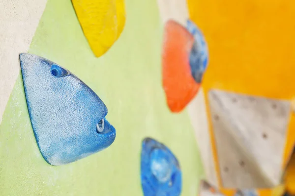 Climbing wall with artificial boulders — Stock Photo, Image